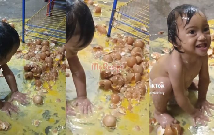 anak mandi telur